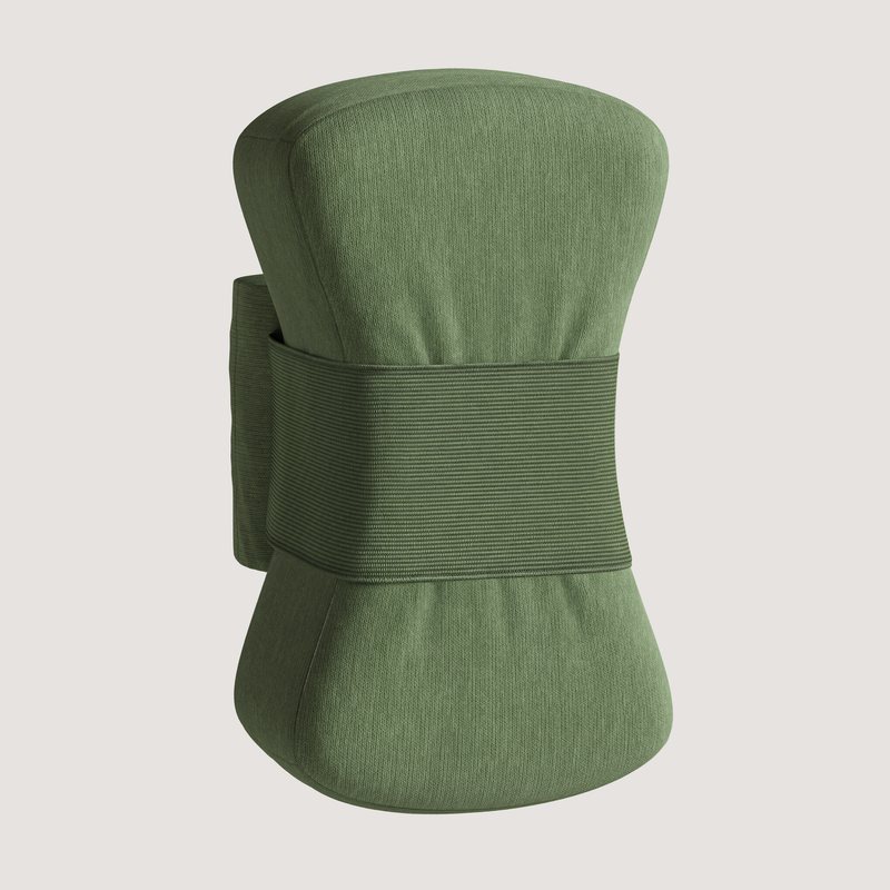 Plumb product study render, three-quarter view, showing the contoured hourglass profile of the covered foam pillow.